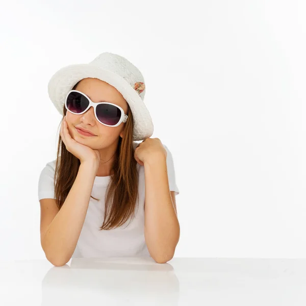 Thoughtful young girl in a fashionable outfit — Stock Photo, Image