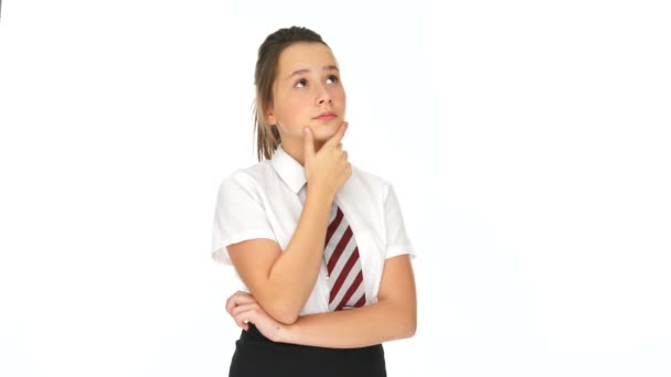 Young schoolgirl deep in thought — Stock Video