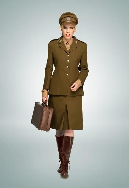 Mujer glamurosa en uniforme militar Imagen De Stock