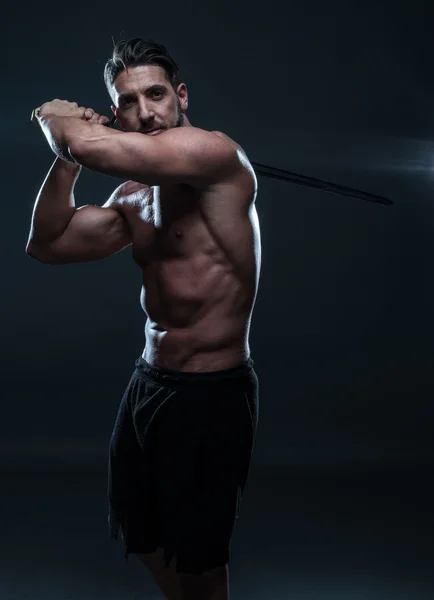 Gorgeous Shirtless Muscled Man Holding a Sword — Stock Photo, Image