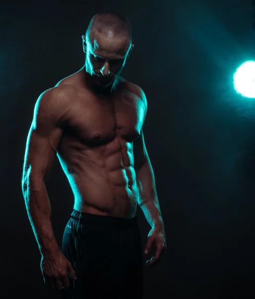 Shirtless Athletic Man Looking Down with Spotlight — Stock Photo, Image