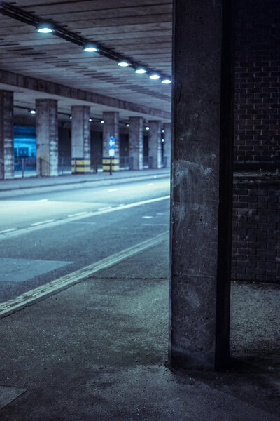 Covered Street Illuminated at Night