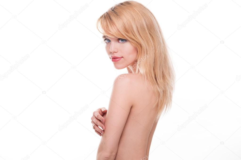 Young Blond Woman Posing Nude in Studio