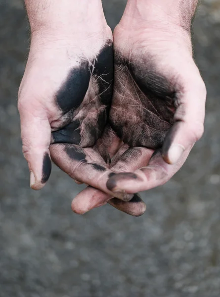 Empty cupped hands dirty of charcoal — Stock Photo, Image