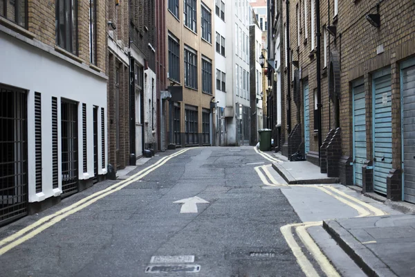 One way narrow urban street — Stock Photo, Image