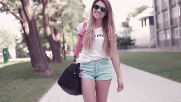 Pretty Teen Girl in Trendy Fashion outfit Smiling at Camera — Stock Video