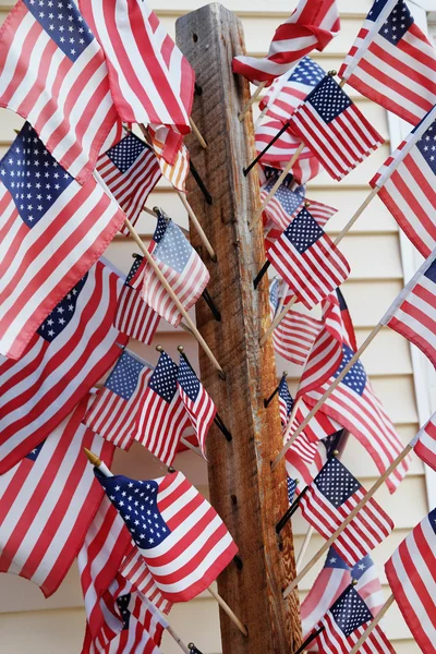 Bunch of american flags on the house — Stock Photo, Image