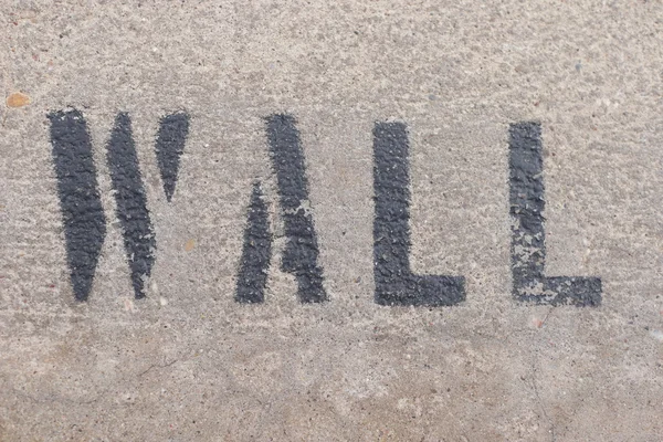 Letras de parede na parede de mármore — Fotografia de Stock