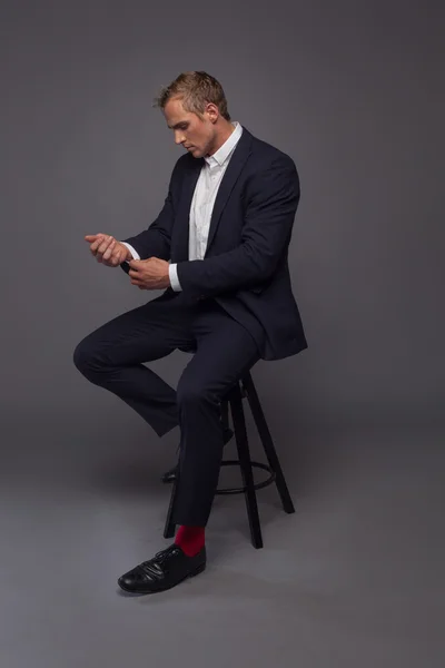 Elegant young fashion man in tuxedo — Stock Photo, Image