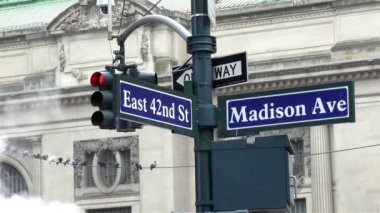 Detailed view of a street name sign in Manhattan, New York.