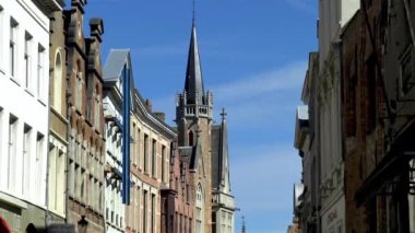 Traditional, medieval buildings on Wollestraat, Bruges, West Flanders, Belgium.