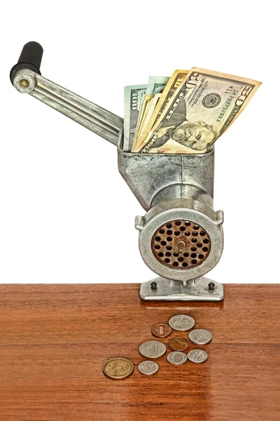 Dollar banknotes in meat grinder and coins on table. — Stock Photo, Image