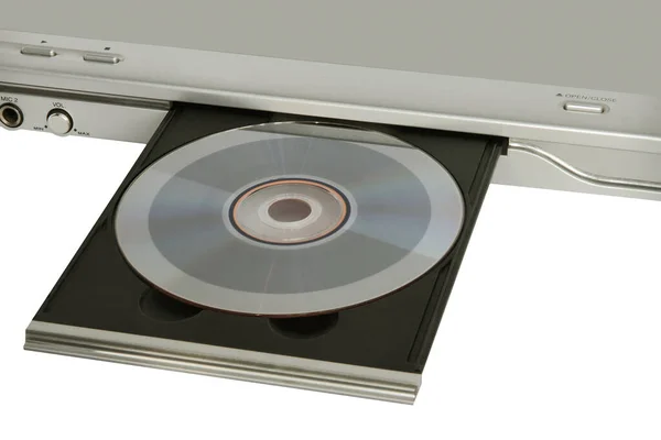 挿入されたディスクを持つDvdプレーヤーは 白の背景にクローズアップ — ストック写真