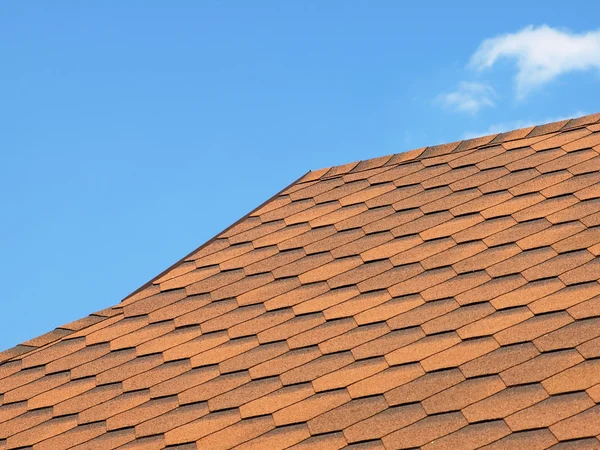 Roof of bituminous tiles taken closeup. Royalty Free Stock Photos