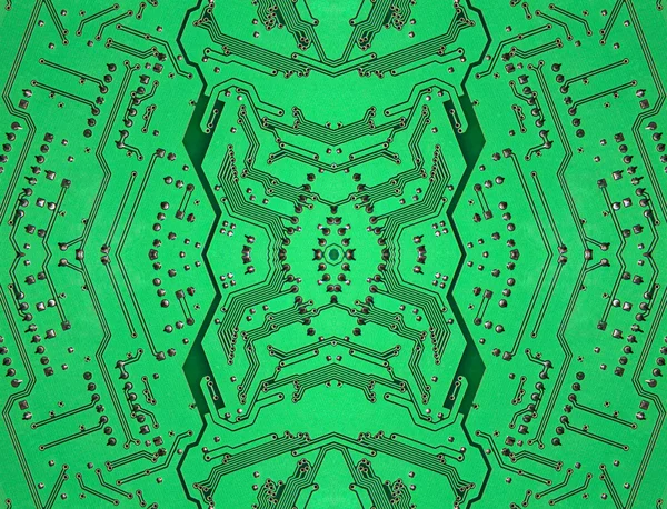 Green symmetrical electronic microcircuit taken closeup. — Stock Photo, Image