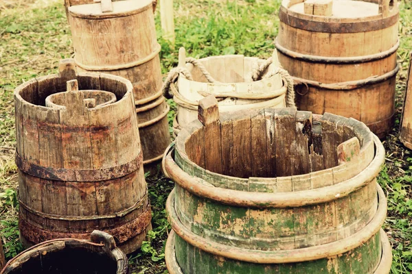 Old wooden buckets and barrels. — Stock Photo, Image