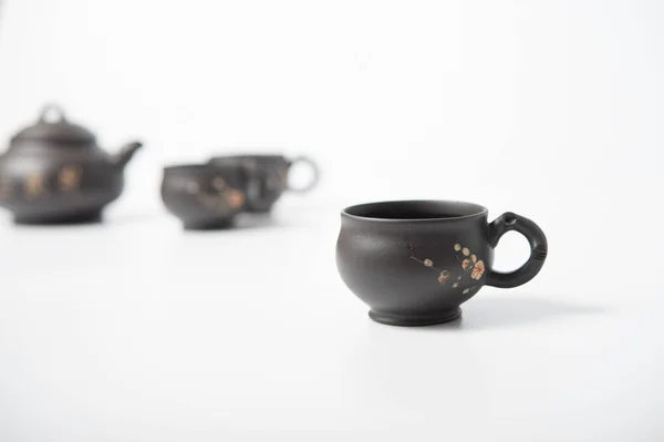 Набор чая из красной посуды — стоковое фото
