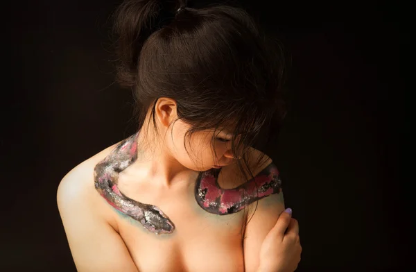 A pretty woman with a snake painting — Stock Photo, Image
