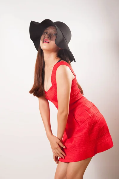 Uma senhora de vestido vermelho — Fotografia de Stock