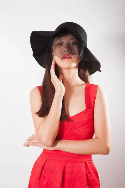 Uma senhora de vestido vermelho — Fotografia de Stock