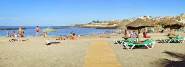 Sandy beach, view of the Duke Castle, Costa Adeje, Tenerife, Spa