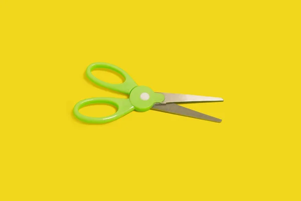 Top view of scissors isolated on a yellow background — Stock Photo, Image