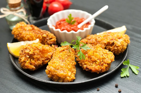 Gebratene Chicken Wings - paniert Stockbild