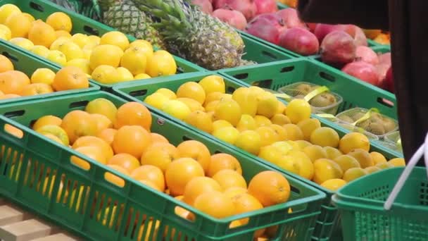 Buyer Chooses Fruits Store Woman Buys Lemons — Stock Video