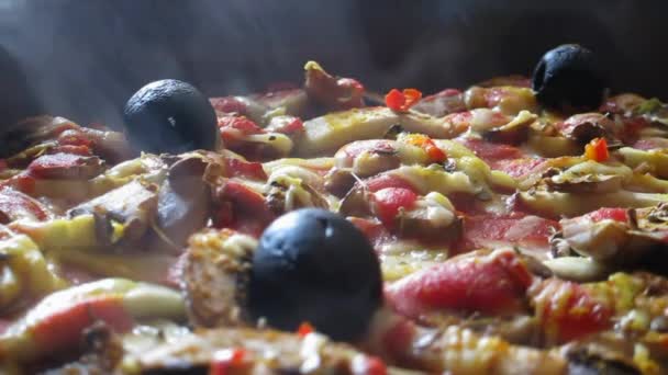 The smell of fresh prepared pizza close-up . — Stock Video