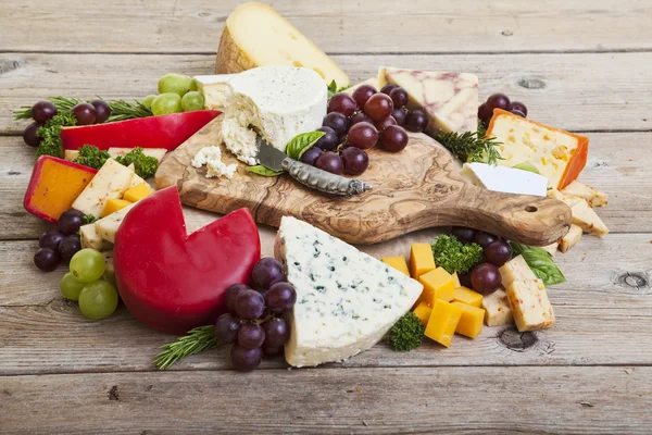 Assorted cheeses and spreads — Stock Photo, Image