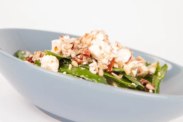 Spinach Dried Tomatoes Feta Cheese Sunflower Seeds Salad Being Eaten — Stock Photo, Image