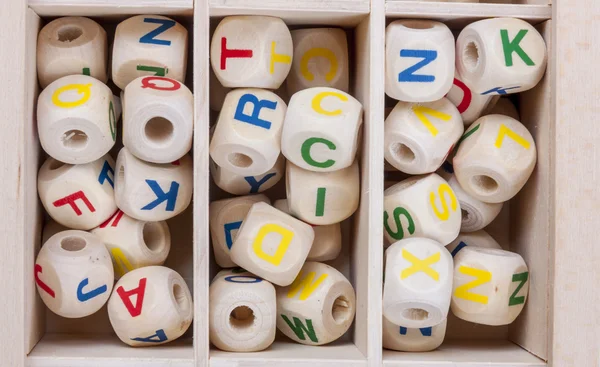 Wooden letters in the wooden box — Stock Photo, Image