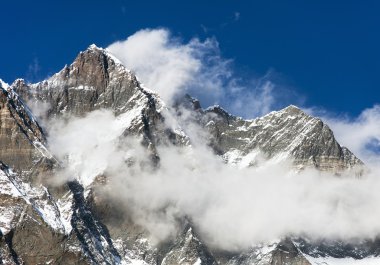 top of Lhotse and Nuptse with clouds on the top