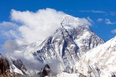 view of Everest with beautiful clouds clipart