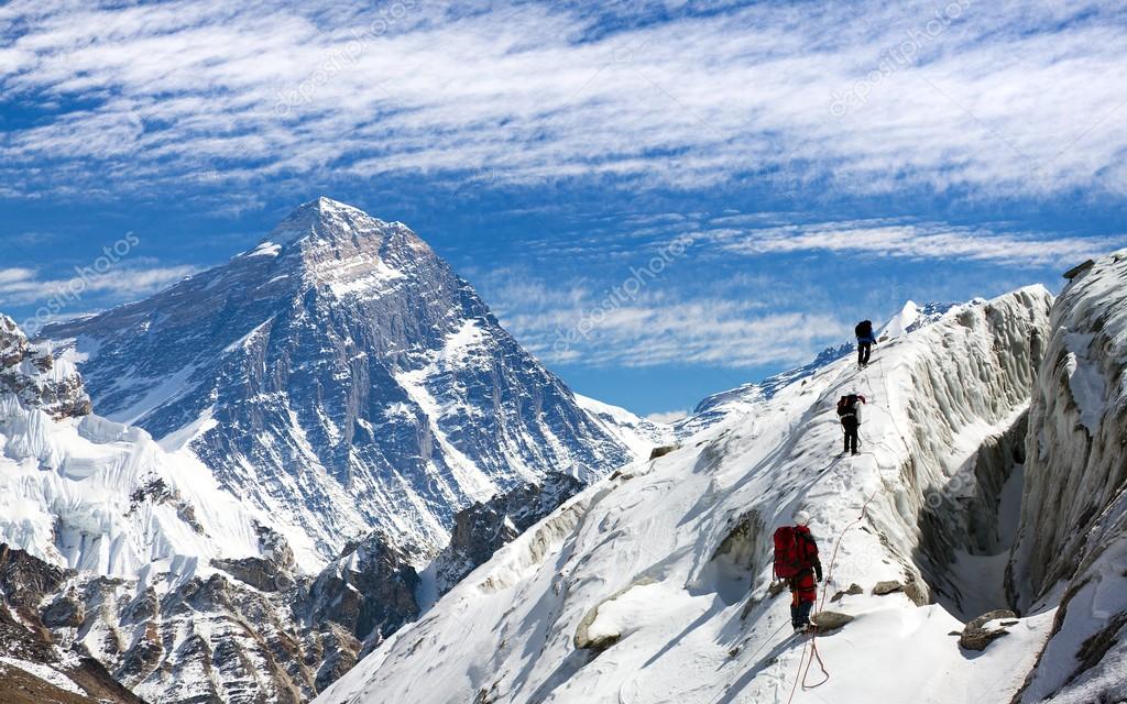 view of Everest and Lhotse with group of climbers