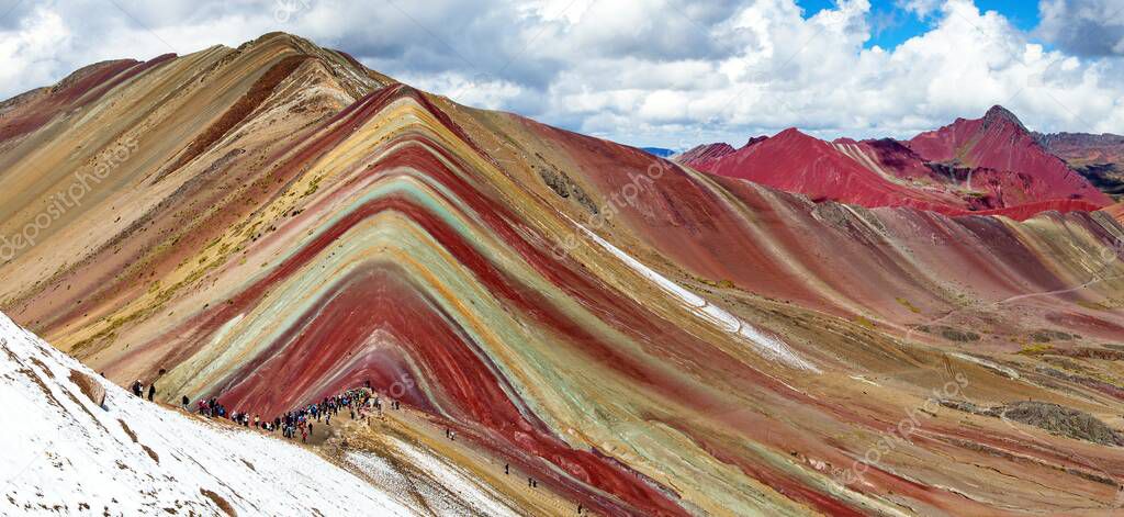 Rainbow mountains or Vinicunca Montana de Siete Colores with people, Cuzco region in Peru, Peruvian Andes, panoramic view