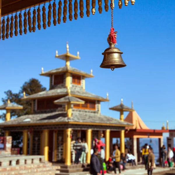 Bronze bell in Surkanda Devi Mandir Hindu temple, Mussoorie road, Uttarakhand, India