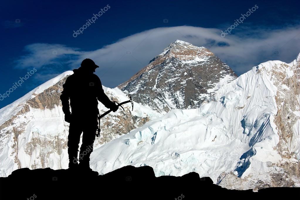 Mount Everest from Kala Patthar and silhouette of man