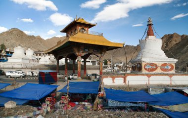 Stupas, bazaar and Friendship Gate in Leh - Ladakh clipart