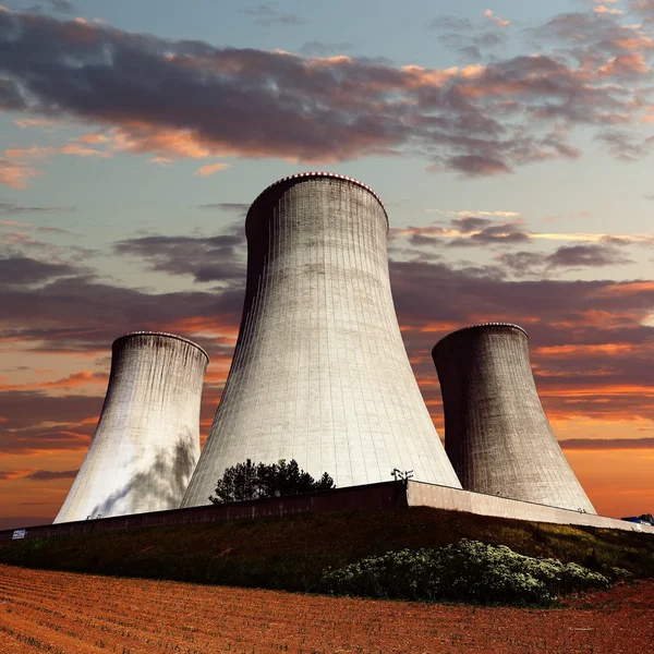 Evening colored view of cooling tower — Stock Photo, Image