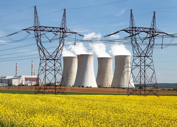 Power plant Dukovany with golden rapeseed field — Stock Photo, Image