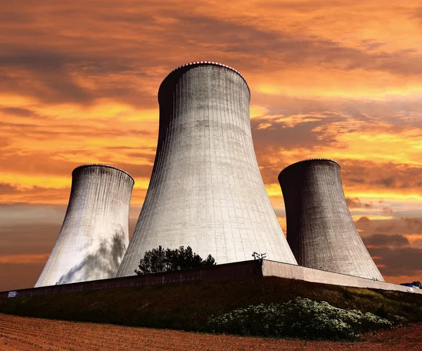 Evening colored view of cooling tower — Stock Photo, Image