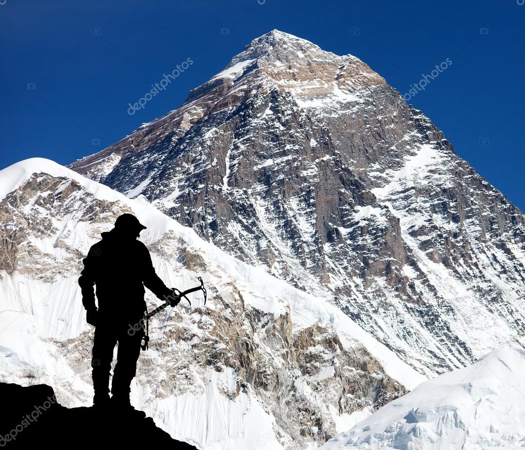 Mount Everest from Kala Patthar and silhouette of man