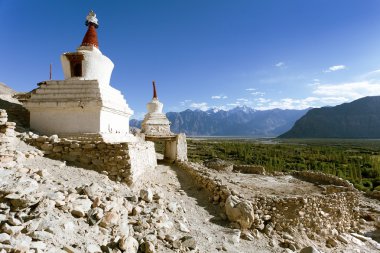 View of buddhist stupas in Nubra valley, Ladakh clipart