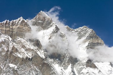 top of Lhotse and Nuptse with clouds on the top