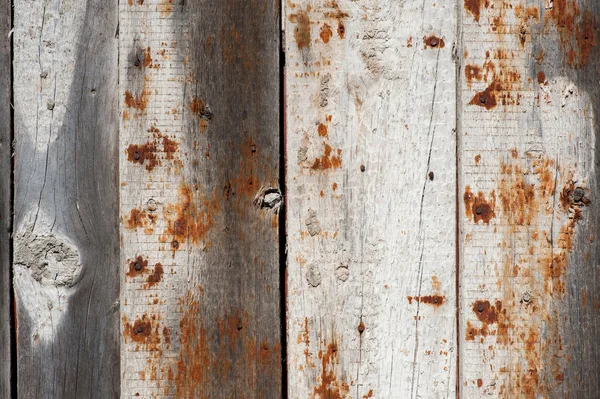 Grå trä gammal gringe plankor bakgrund med rostig spik — Stockfoto