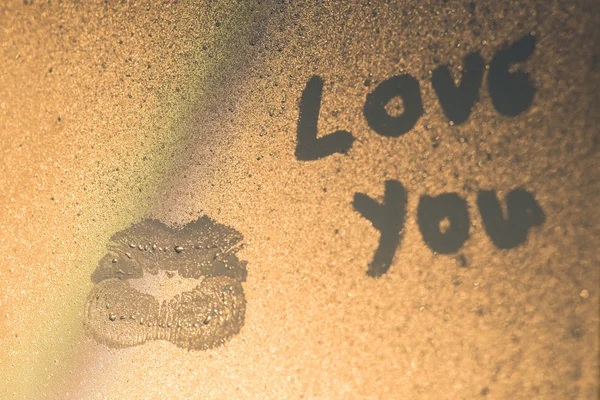 Kiss on the sweaty glass background — Stock Photo, Image