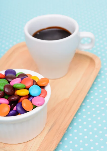 Hot chocolate and colorful candy — Stock Photo, Image