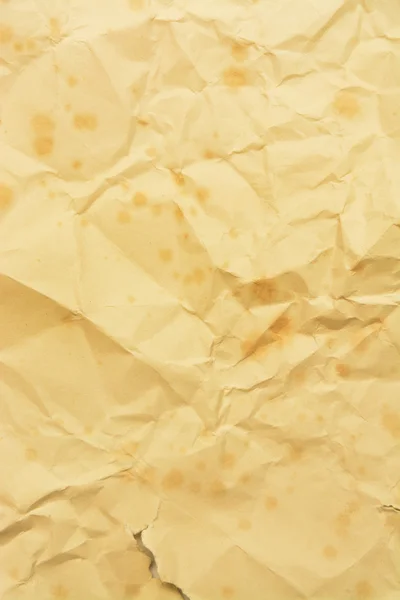 Смятый винтажный желтый гранж бумажный фон — стоковое фото