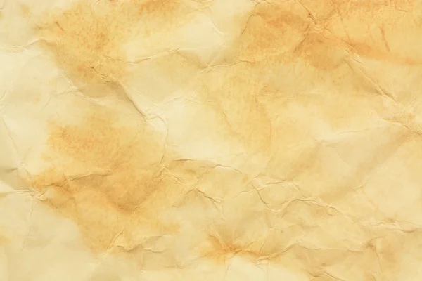 Смятый винтажный желтый гранж бумажный фон — стоковое фото